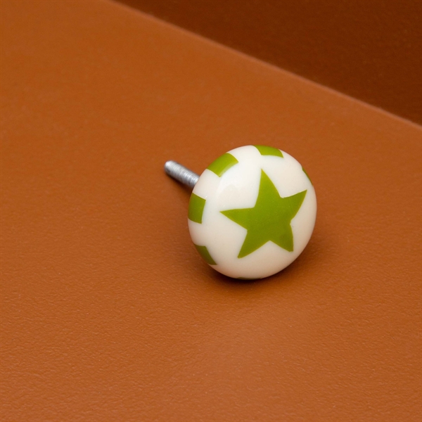 Knob with green star
